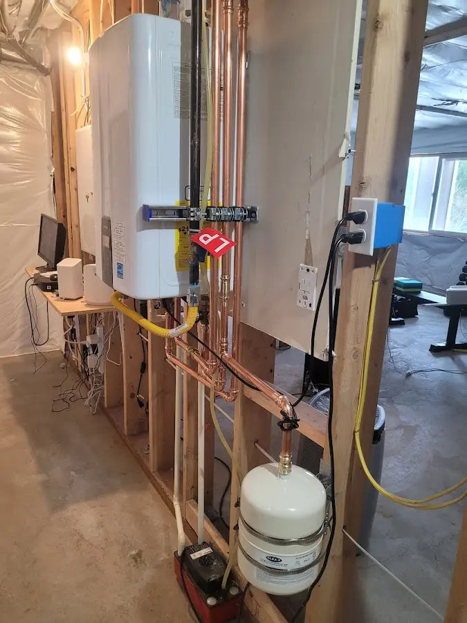 Licensed plumber repairing a kitchen sink in Davie